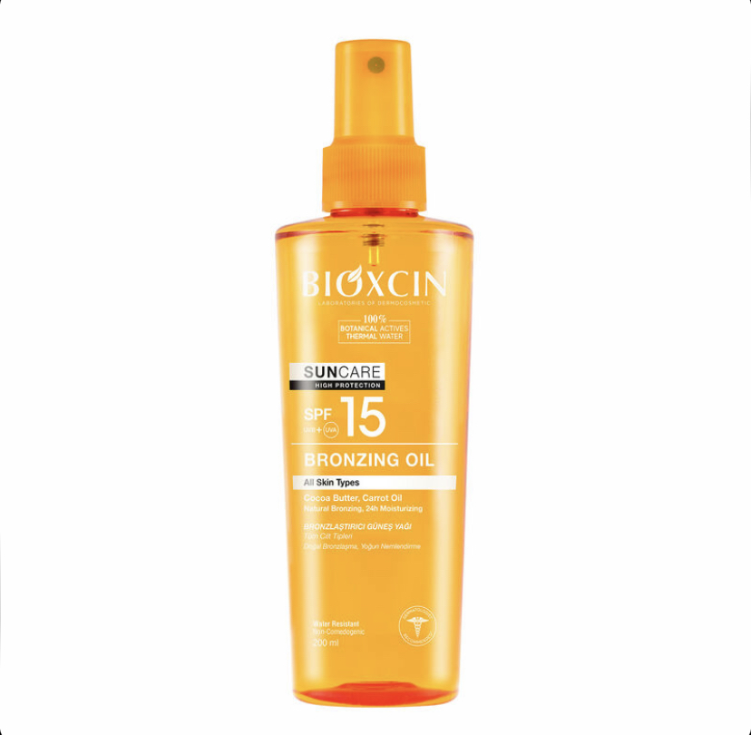 روغن آفتاب برنز کننده کاکائو و هویج بیوکسین Bioxcin spf15 حجم 200 میل
